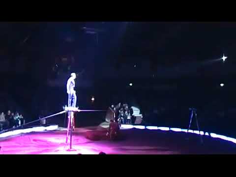 Circus artist performing Skipping Rope on the wire