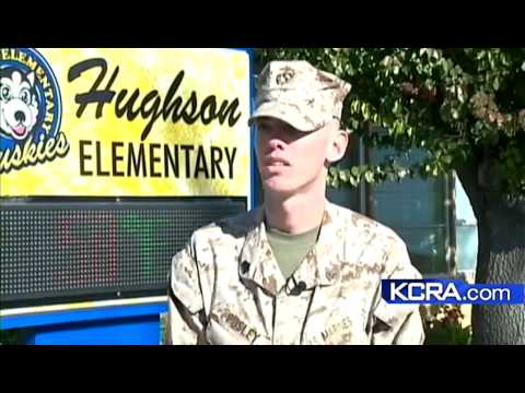 Hughson Marine stands watch over school