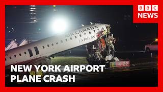 Two pilots killed after plane and ground vehicle collide at New York's LaGuardia Airport | BBC News
