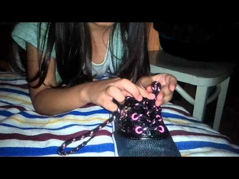 Betzaida learns to tie her shoes