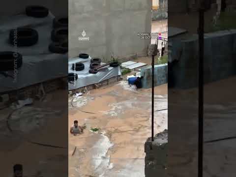 Men pulled from vehicle stranded by floods in Syria | AJ #shorts