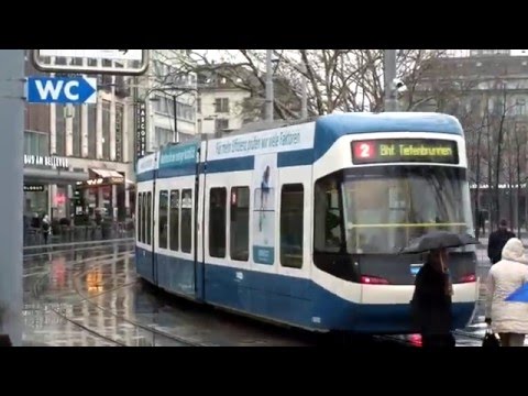 Zurich - trams at Bellevue in the rain - 7 January 2016