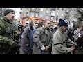 Captured Ukraine soldiers face angry crowd at.