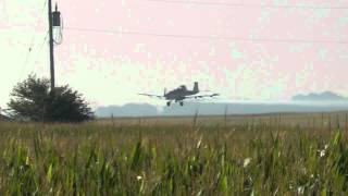 preview picture of video 'Crop Duster in the MidWest Flying low to the ground over power lines South of Badger, Iowa'