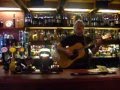 Dean Friedman playing another personal song at the Bar for Mundell Music