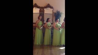 Bride sings "From This Moment" by Shania Twain while walking down the aisle