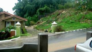 preview picture of video 'Heavy Rainstorm on a Residential Road in the Hills of Ocho Rios Jamaica 1 of 2'