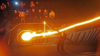 Playing with molten lava in Iceland