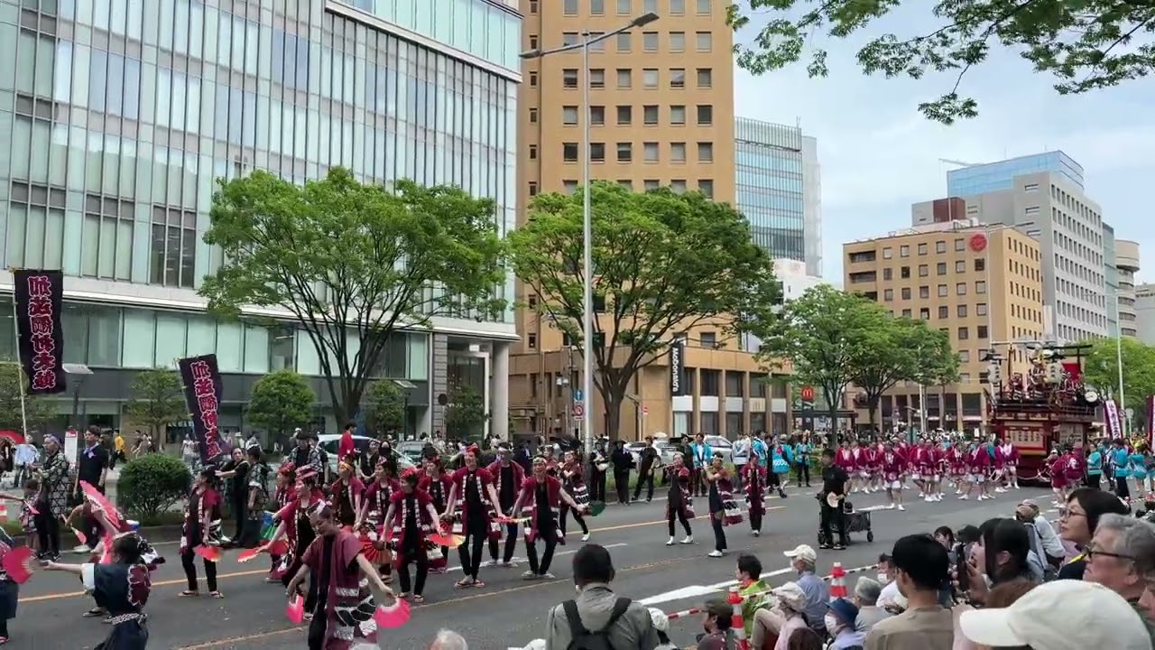 Experience the vibrant spectacle of the Aoba Matsuri Parade.