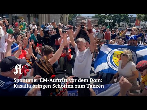 Spontaner EM-Auftritt vor dem Dom: Kasalla bringen Schotten zum Tanzen