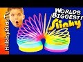Worlds Biggest SLINKY Surprise Egg! POOL Party + ...
