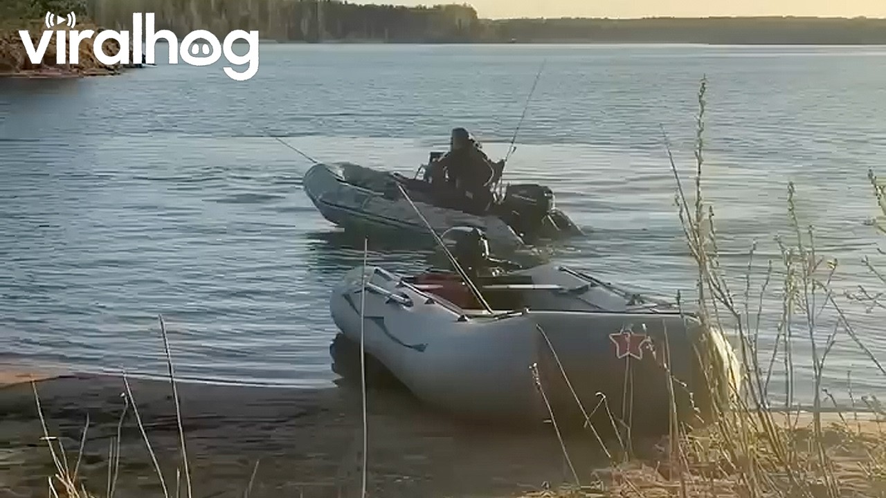 Inflatable Fishing Dinghy Capsizes || ViralHog