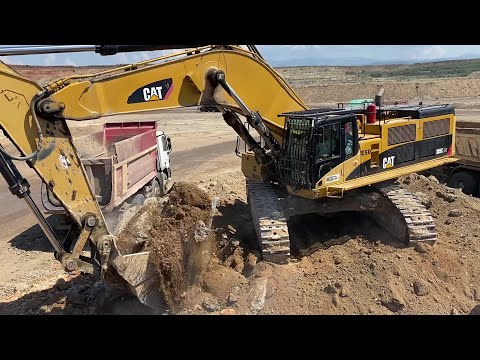 Caterpillar 385C Excavator Loading Mercedes & MAN Trucks - Interkat SA