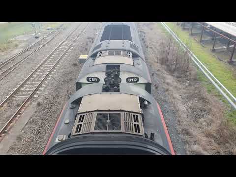 Specialised Container Transport's 6BM9 (CSR012 - CSR001 - CSR005) passes through Leightonfield, NSW.