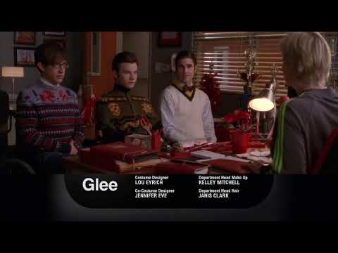 Closing ensemble tableau from the Christmas episode set, spotlighting choir formation