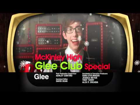 Glee S3E9 promo frame with Blaine and Kurt in classic TV holiday special setting