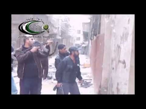 اشتباكات خلال اقتحام كتيبة الشهيد حسين مفعلاني لأحد مواقع قوات النظام في شارع فلسطين في مخيم اليرموك في مدينة دمشق