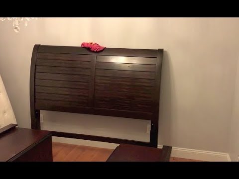 Part of a video titled Assembling Storage Bed Frame with Drawers - ( Headboard ) - YouTube