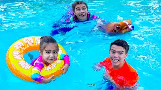 Nastya, Artem and Mia help the puppy get out of the pool