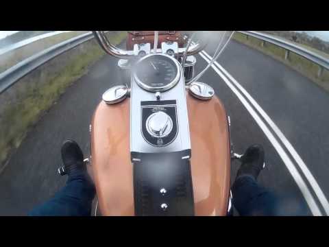 Kuryakyn Highway Pegs Harley Fatboy in the rain