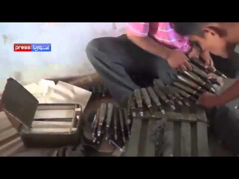 تجهيزات عناصر لواء خط النار قبل عملية السيطرة على تل الحماميات في ريف حماة