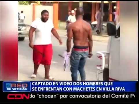 Two men caught on video fighting with machetes in Villa Riva