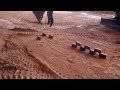 Caterpillar Excavator Stacking Bricks Trick