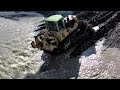 Bulldozer at work in the Porter River after Red Warning flood
