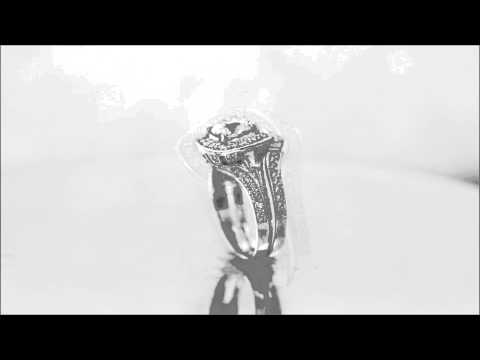 18K WHITE GOLD ROUND AND BAGUETTE CUT DIAMOND ENGAGEMENT RING AND BANDS 2.00CTW - KNR INC - 478
