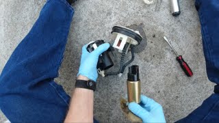 Replacing Fuel Pump, 2002 Mitsubishi Eclipse, I take apart the assembly to replace the pump. $23.87