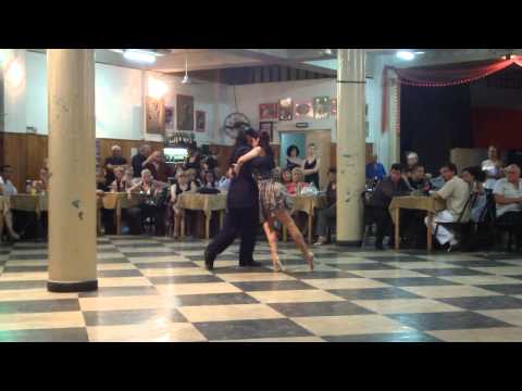  Andres Laza Moreno  and  Isabel Acuña  are  dancing  to  the  tango  "  Dime Mi Amor  "