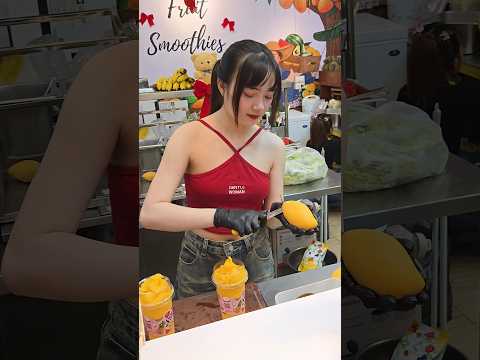 Thai Girl Selling Mango Smoothie at Jodd Fairs Night Market