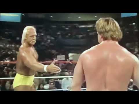 Roddy Piper and Hulk Hogan shake hands after tagging together in Dec 1986