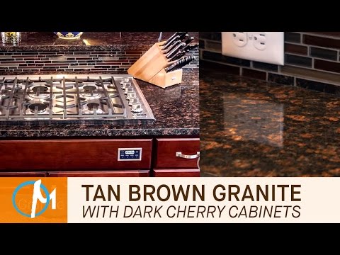 Tan brown granite kitchen countertops with dark cherry cabin...