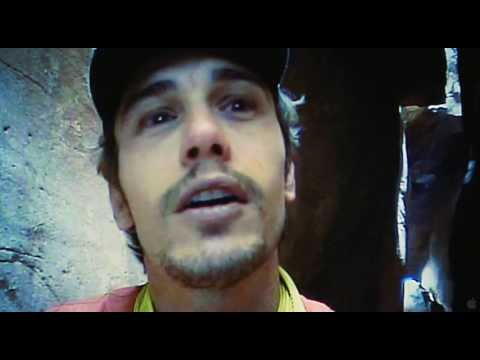 127 Hours trailer frame: bike and desert rush setting up the opening cue