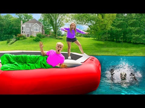 24 Hour Overnight Challenge on Backyard Inflatable Water Trampoline!! (Pond Monster Found Hiding) Video
