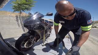 How to unload a yamaha motorcycle from flatbed tow truck like a BOSS!