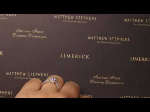 52513- Round Brilliant Halo with Diamond Set Split Shank T0.70ct