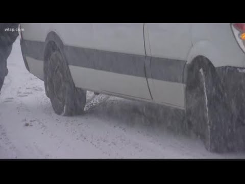 Snow in Colorado sends cars slipping