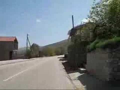 Zmijavci - Kroz Zmijavce cestom i pogled s Gradine by STUDIO POSKOK Croatia