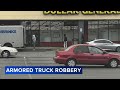 Image shows suspect armed with rifle during brazen armored truck robbery in Philadelphia