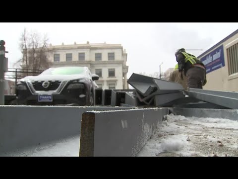 Arctic cold front settles along Front Range, outdoor workers take bone-chilling temps in stride