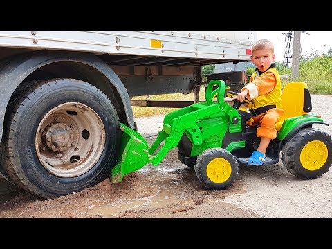 Um caminhão preso na lama - Dima monta um trator para ajudar