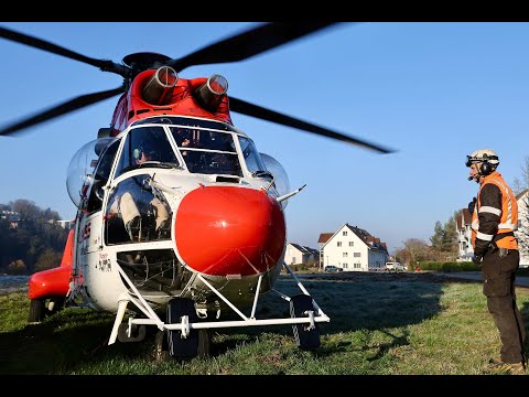 Super Puma helicopter Heliswiss International   tree removal along a railway line