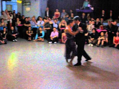  Adrian Veredice  and  Alejandra Hobert  are  dancing  to  the  tango  "  Desencuentro  "  in  2014