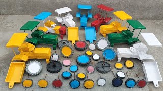 Mini yellow colour tractor tyres fitting and loading at terrace tractor video 