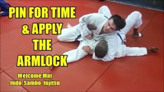 PIN FOR TIME AND APPLY THE SUBMISSION TECHNIQUE  2 Pins and 3 Armlocks