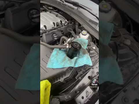 Emptying out the oil catch can on the camaro ss