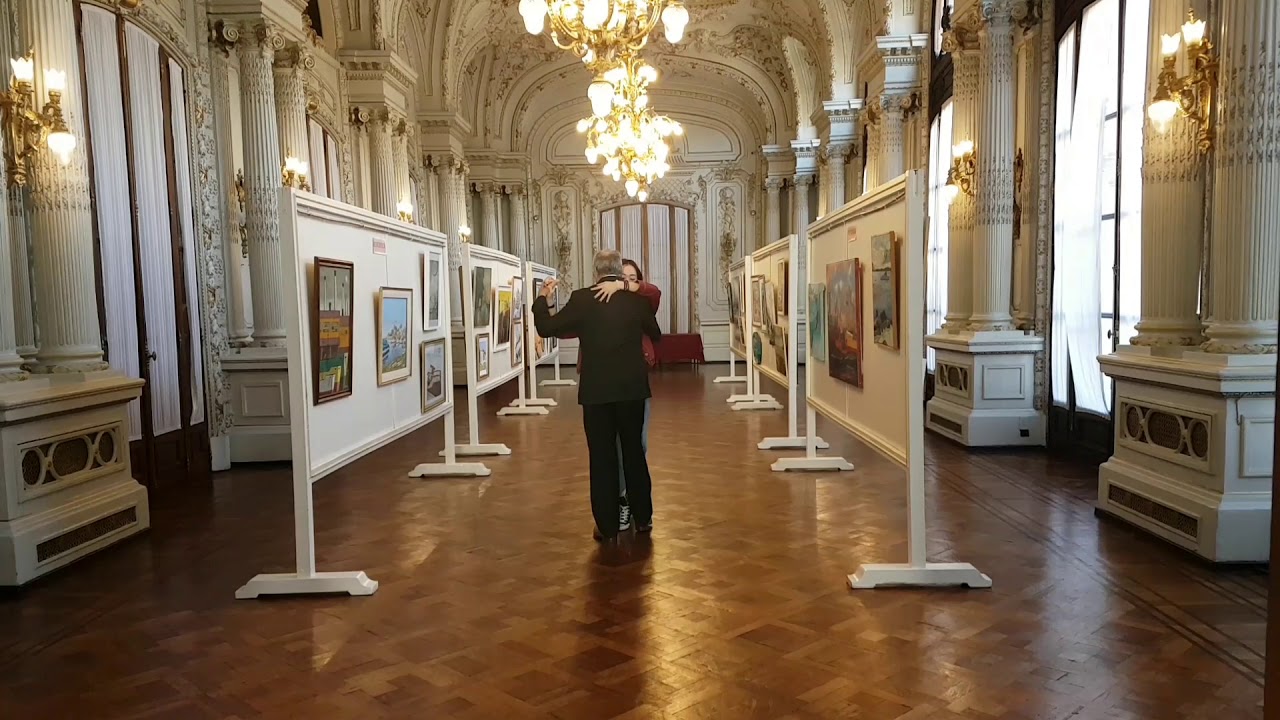 Tango dancing on beautiful place. Claire Zhang, Carlos Neuman