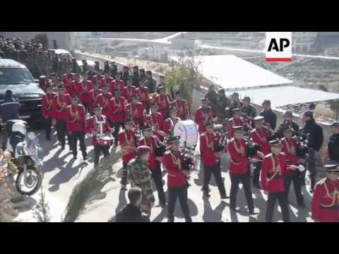 Hundreds attend military funeral of Palestinian envoy who died in Prague blast